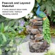 Glitzhome 20.5"H 4-Tierd Peacock w/Stacked Stone Polyresin Outdoor Fountain with Pump and LED Light (KD)