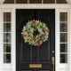 Glitzhome 24"D Mixed Floral Eucalyptus Wreath Includes a Complimentary Black Metal Wreath Hanger