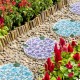 Glitzhome 10"D Set of 2 Cement Blue and Purple Hydrangea Textured Stepping Stones