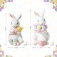 Glitzhome Set of 2 Easter Resin Bunny Holding Macaron Table Decor