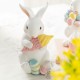 Glitzhome Set of 2 Easter Resin Bunny Holding Macaron Table Decor