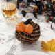 Glitzhome 4.75"H Halloween Striped Glass Pumpkin with Bow