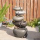 Glitzhome 24.5"H 5-Tiered Zen Style Stacked Pebbles Polyresin Outdoor Fountain with Pump and LED Light