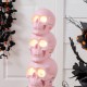 Glitzhome 31.50"H Halloween MGO Lighted Stacked Pink Skull with Black Urn Porch Decor w/Timer