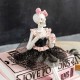 Glitzhome 8.25"H Halloween Polyresin Pink Skeleton Ballerina on Books Table Decor