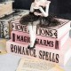 Glitzhome 8.25"H Halloween Polyresin Pink Skeleton Ballerina on Books Table Decor