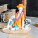 Glitzhome 11.50"H Halloween Polyresin Skeleton on Beach Table Decor
