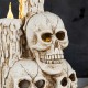 Glitzhome 14.25"H Lighted Halloween Resin Skulls with Candles Table Decor w/Timer