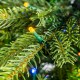 Glitzhome 6ft Pre-Lit Green Full Fir Artificial Christmas Tree with 300 Warm White and Multi-Color Twinkling Lights, 10 Function with Foot Pedal and Remote