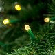 Glitzhome 9ft Pre-Lit Green Pencil Spruce Artificial Christmas Tree with 580 Warm White and Multi-color Lights, 9 Function with Remote,Simple Setup