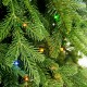 Glitzhome 11ft Pre-Lit Green Pencil Spruce Artificial Christmas Tree with 800 Warm White and Multi-color Lights, 9 Function with Remote,Simple Setup