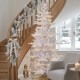Glitzhome 6ft Deluxe Pre-Lit White Flocked Slim Fir Artificial Christmas Tree with 260 Warm White /Multi-color Lights, 9 Function with Foot Pedal