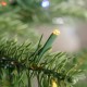 Glitzhome 9ft Pre-Lit Green Full Fir Memory wire Artificial Christmas Tree with 3000 Micro Lights, 10 Function, Remote Control